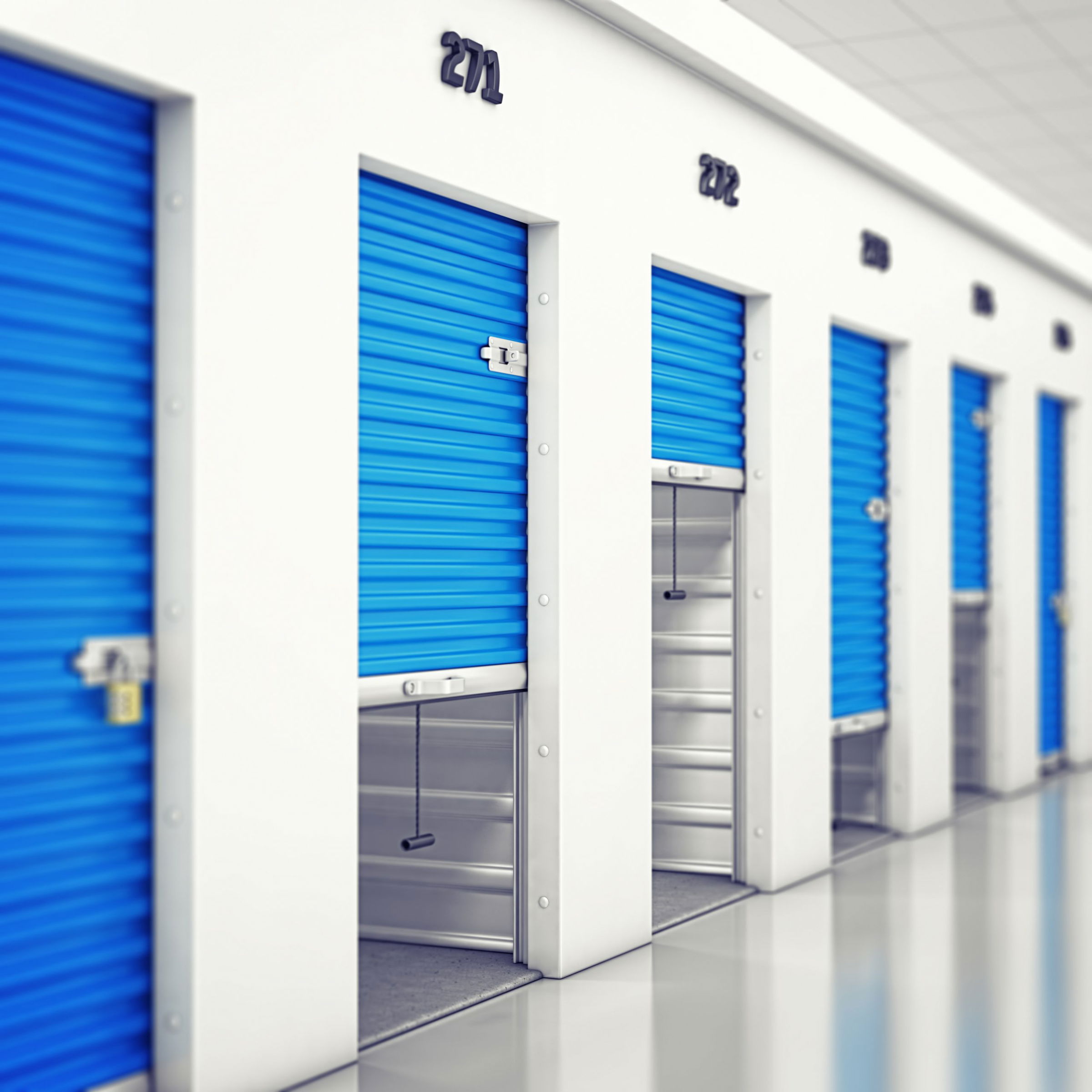 storage units with blue sliding storage unit doors open to different amounts